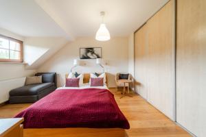Voodi või voodid majutusasutuse Józefina Apartament's z dotępem do mini SPA toas