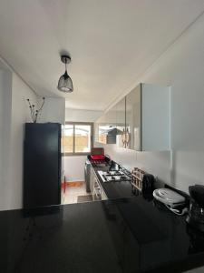 Køkken eller tekøkken på résidence ASILAH BERALMAR