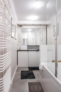 Koupelna v ubytování Apartament Szafirowy + 137 fotografií
