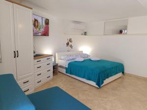 Postel nebo postele na pokoji v ubytování Apartment Igralište Mirakul