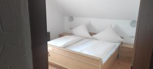 Postel nebo postele na pokoji v ubytování Pension Brix