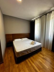Postel nebo postele na pokoji v ubytování Hotel Rubin