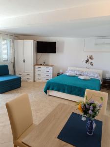 Postel nebo postele na pokoji v ubytování Apartment Igralište Mirakul