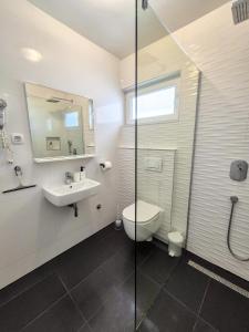 Koupelna v ubytování Principessa Rooms