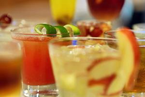 a group of glasses of drinks on a table at TRYP BY WYNDHAM São Paulo Airport - Hotel de Transito Terminal 3 INTERNACIONAL - Lado Ar - Área restrita á passageiros já embarcados e sem bagagens para despachar - Transit Hotel, only carry-on in Guarulhos