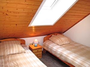 Postel nebo postele na pokoji v ubytování Holiday Home Altes Schöpfwerk-4 by Interhome