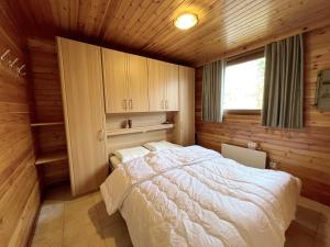 Postel nebo postele na pokoji v ubytování Le Bochetay 13