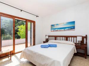 Postel nebo postele na pokoji v ubytování Apartment S'Esquirols Nº2 by Interhome