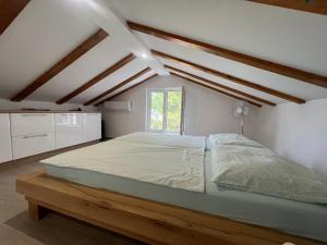 En eller flere senge i et værelse på Meerblick mit Traumterrasse