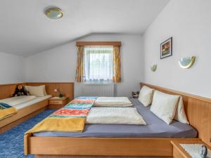 Postel nebo postele na pokoji v ubytování Apartment Markus by Interhome + 19 fotografií