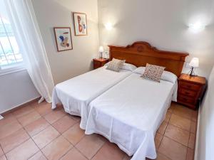 Posteľ alebo postele v izbe v ubytovaní Holiday Home Comino by Interhome + 28 fotografií