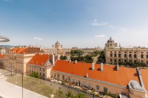 a view of a city with buildings and roofs at House of Ble in Vienna