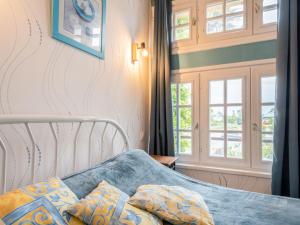 Ένα ή περισσότερα κρεβάτια σε δωμάτιο στο Holiday Home Tytisa N-1 by Interhome