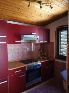 Kuchyň nebo kuchyňský kout v ubytování M&R apartmani Rovinj