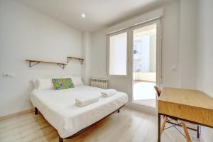 Postel nebo postele na pokoji v ubytování Apartamento Las Terrazas del Ayuntamiento by Clabao