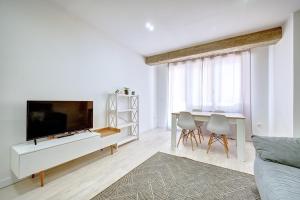 TV a/nebo společenská místnost v ubytování Apartamento Las Terrazas del Ayuntamiento by Clabao