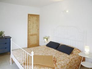 Una cama o camas en una habitación de Apartment Luca - PRE171 by Interhome 12 fotos más