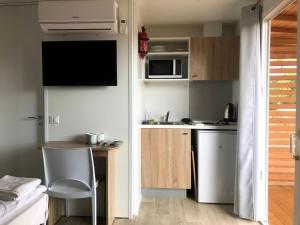 Kuchyň nebo kuchyňský kout v ubytování Bella Camping