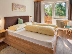 Postel nebo postele na pokoji v ubytování Holiday Home Penz by Interhome