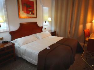 Cama o camas de una habitación en Hotel Polamar