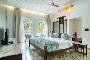 Ένα ή περισσότερα κρεβάτια σε δωμάτιο στο Maravilha Boutique Stay Goa