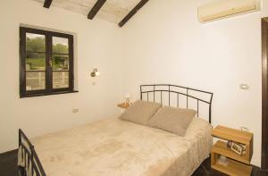 Letto o letti in una camera di Peaceful Villa with Pool & Sauna, La Casa di Kyra
