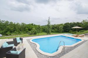 Piscina di Peaceful Villa with Pool & Sauna, La Casa di Kyra o nelle vicinanze