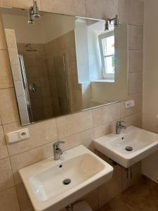 Koupelna v ubytování Apartmány Havana + 37 fotografií
