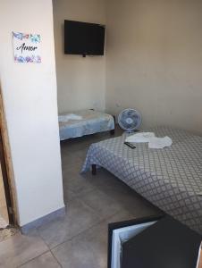 Postel nebo postele na pokoji v ubytování Pousada Beach Porto Novo