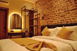 Ein Bett oder Betten in einem Zimmer der Unterkunft Galata Calm Tale Hotel