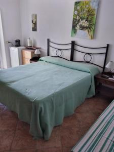 Postel nebo postele na pokoji v ubytování Agriturismo I Due Pini