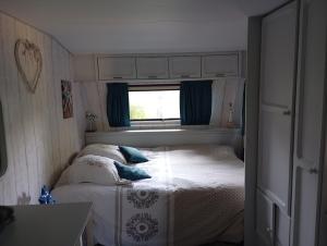 Postel nebo postele na pokoji v ubytování Tiny House plein centre