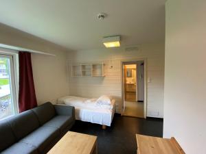 Postel nebo postele na pokoji v ubytování Førde Sommarhotell