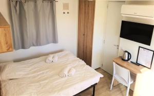 Postel nebo postele na pokoji v ubytování Bella Camping