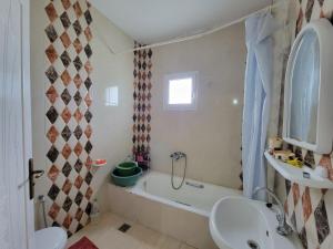 Koupelna v ubytování Maison de vacance climatisée bien équipée