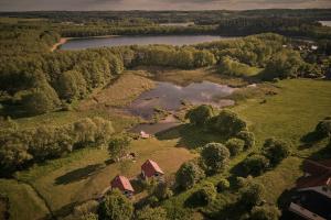an aerial view of a farm and a lake at Swobodna 6 in Swobodna
