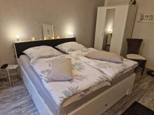 Postel nebo postele na pokoji v ubytování Apartment Rademacher nahe Möhnesee