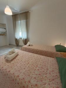 Ένα ή περισσότερα κρεβάτια σε δωμάτιο στο Casa Nina +14 φωτογραφίες