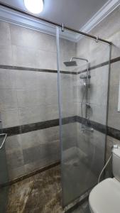 Koupelna v ubytování Madinaty apartment 1 شقة فندقية مفروشة سوبر لوكس في مدينتي