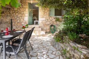 Patio nebo venkovní prostory v ubytování Kerkis Traditional Guesthouse