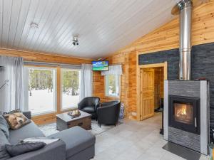 Posezení v ubytování Holiday Home Kuukkelin kehto by Interhome