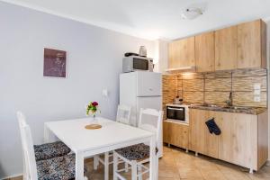 Kuchyň nebo kuchyňský kout v ubytování Kerkis Traditional Guesthouse