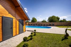 Billede fra billedgalleriet på Drvena bajka Ville za odmor Magnolia i Kamelia i Bilje