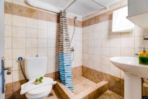 Koupelna v ubytování Kerkis Traditional Guesthouse