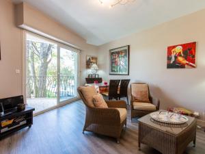 a living room with a couch and chairs and a table at Apartment Marines 2 by Interhome in Soorts-Hossegor