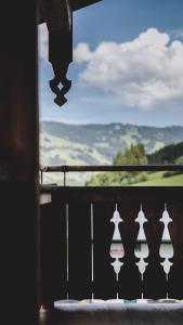 a view of the mountains from a balcony at Wieshofgut in Saalbach-Hinterglemm