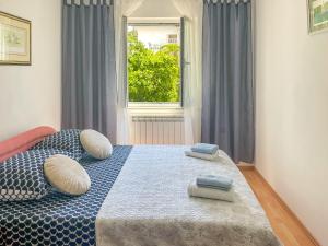 Postel nebo postele na pokoji v ubytování Apartment Ljubica by Interhome