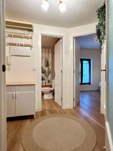 an open living room with a rug on the floor at Apartamento Casa Blanca in Tramacastilla de Tena +18 photos