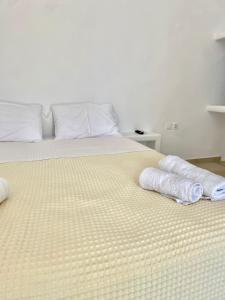 Postel nebo postele na pokoji v ubytování My Oasis Studios Mykonos