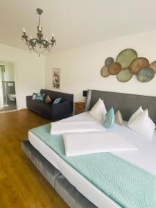 Ένα ή περισσότερα κρεβάτια σε δωμάτιο στο Hotel Garni Vinea Montis